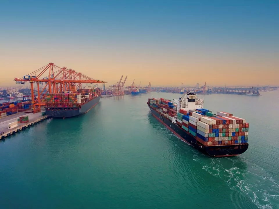 Two large shipping vessels on the water